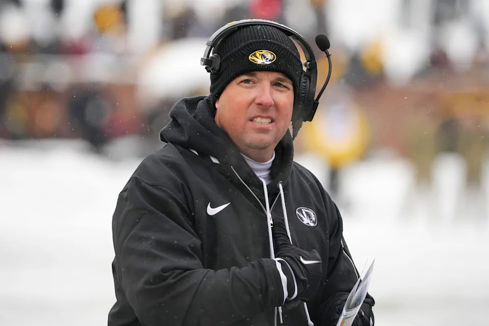 Nov 30, 2024; Columbia, Missouri, USA; Missouri Tigers head coach Eli Drinkwitz watches play against the Arkansas Razorbacks during the first half at Faurot Field at Memorial Stadium. Mandatory Credit: Denny Medley-Imagn Images