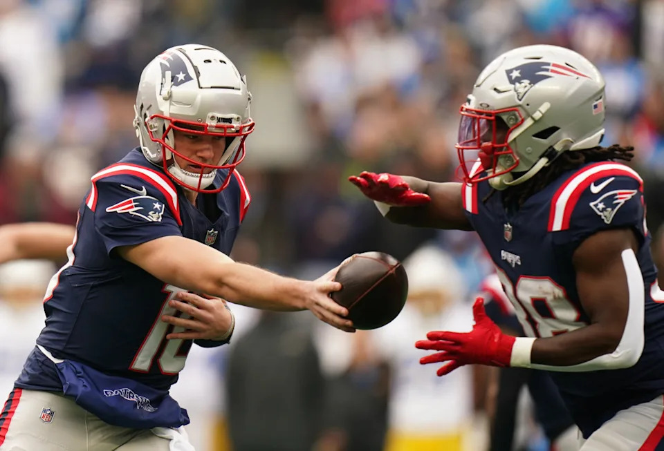 New England Patriots quarterback Drake Maye (10) hands off the ball to running back Rhamondre Stevenson (38).David Butler II-Imagn Images