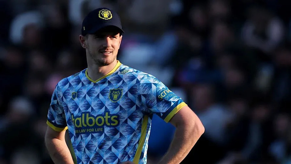 George Garton stands with hands on hips looking into the distance in his Birmingham Bears kit during a match