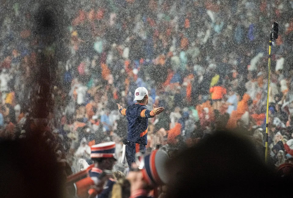 Auburn yell leader takes in the rain as Auburn Tigers take on New Mexico Lobos at Jordan-Hare Stadium in Auburn, Ala., on Saturday, Sept. 14, 2024. Auburn Tigers lead New Mexico Lobos 17-13 at halftime.