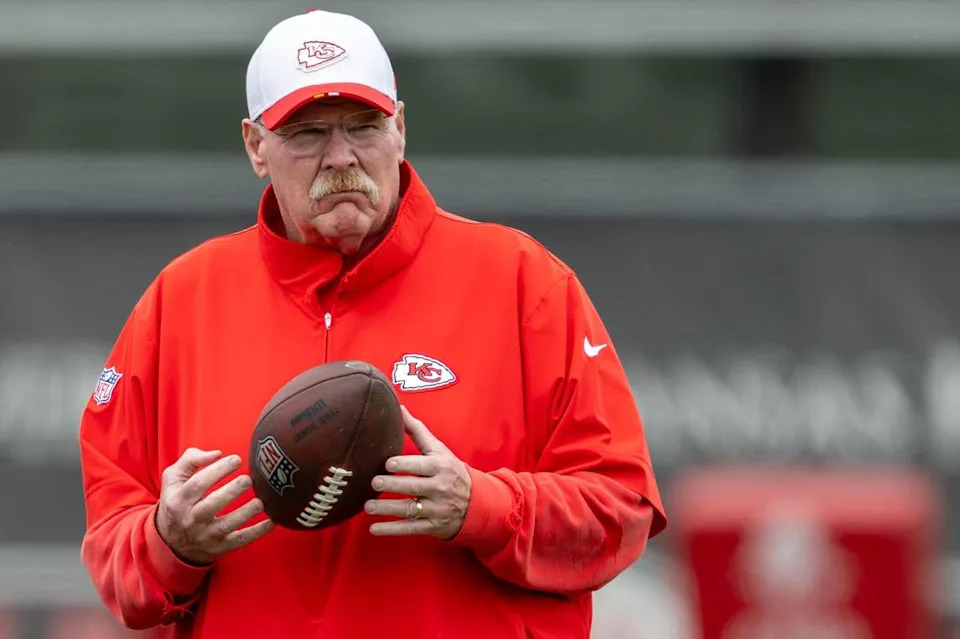 Kansas City Chiefs head coach Andy Reid holds a football while he observes players during practice at Chiefs’ training facility on Thursday, May 29, 2025, in Kansas City.
