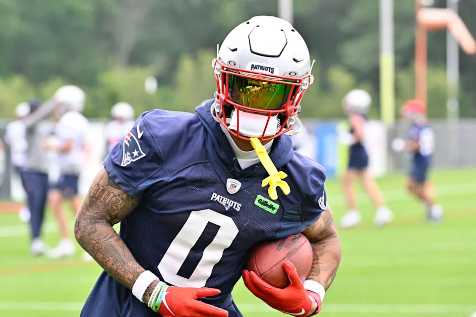 Jun 9, 2025; Foxborough, MA, USA; New England Patriots cornerback Christian Gonzalez (0) runs after the catch during minicamp at Gillette Stadium. Mandatory Credit: Eric Canha-Imagn Images