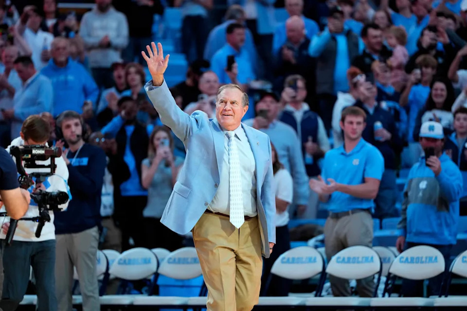Dec 14, 2024; Chapel Hill, North Carolina, USA; North Carolina Tar Heels head football coach Bill Belichick is introduced during half time at Dean E. Smith Center. Mandatory Credit: Bob Donnan-Imagn Images