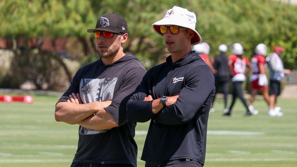 Cardinals head coach Jonathan Gannon and DC Nick Rallis look on...