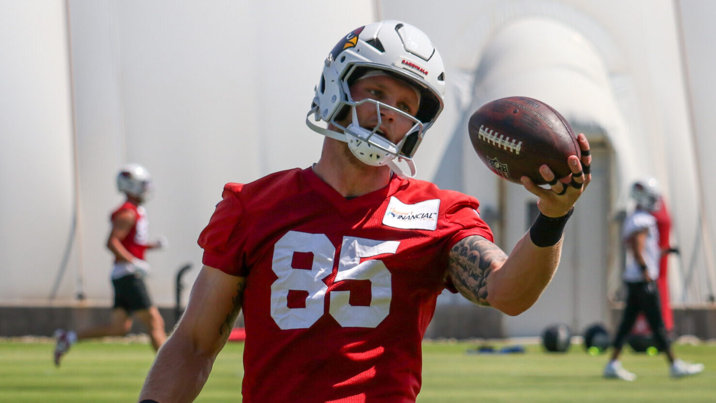 Cardinals TE Trey McBride makes a catch during minicamp. The tight end is a likely candidate to mak...
