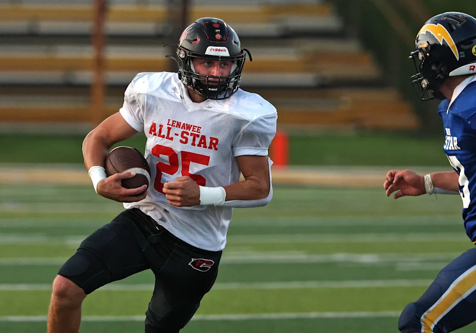 Jack Felts of Clinton carries the ball during the Monroe County vs. Lenawee County All-Star Football Game at Adrian College on Friday, June 20, 2025.