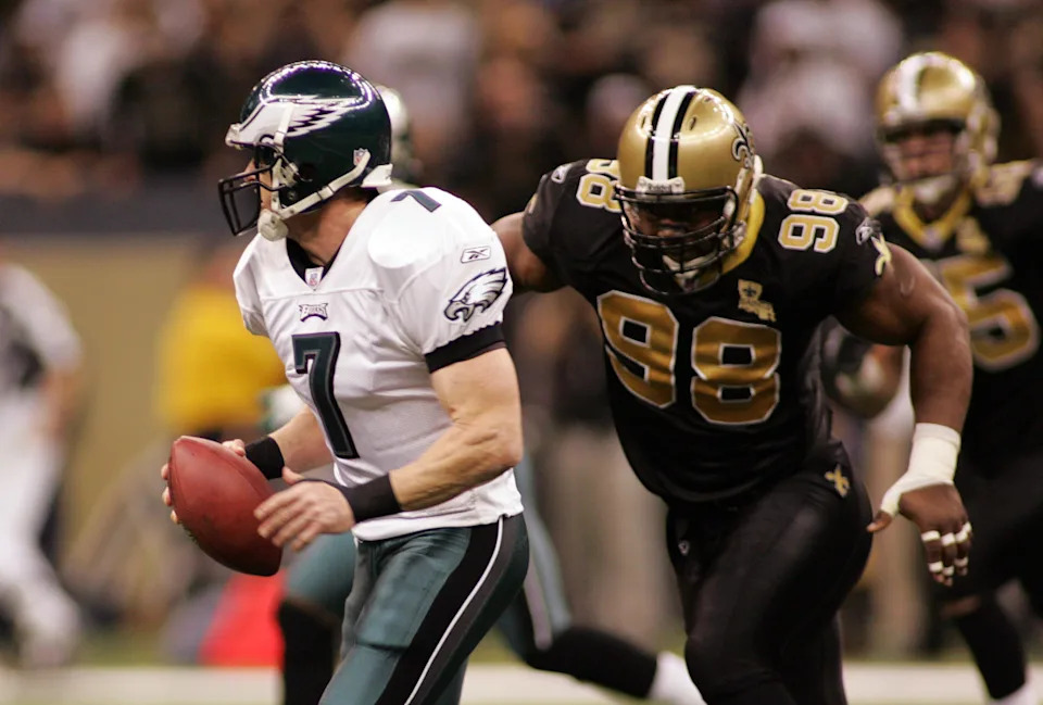 Jan. 13, 2007; New Orleans Saints defensive tackle Willie Whitehead chases down Philadelphia Eagles quarterback Jeff Garcia (7). Mandatory Credit: John David Mercer-Imagn Images © 2006 John David Mercer