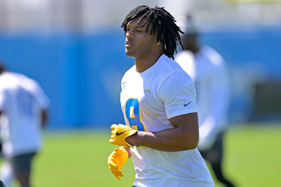 Chargers rookie running back Omarion Hampton jogs during practice in May.