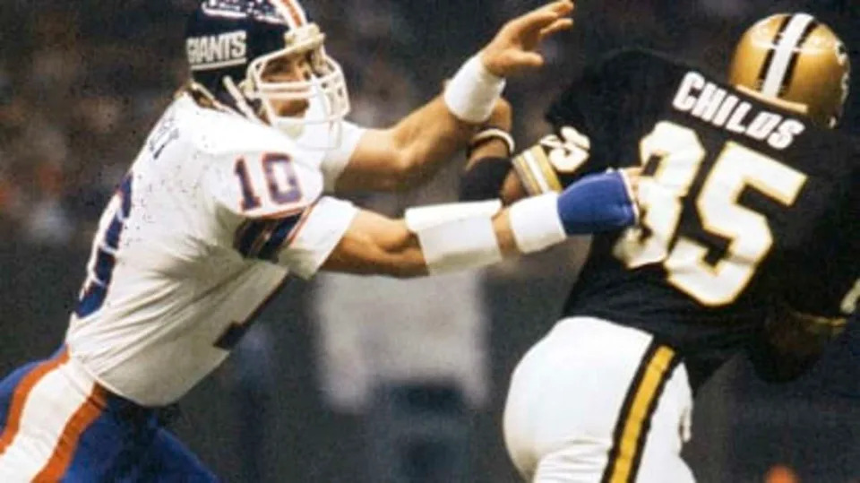 New Orleans Saints tight end Henry Childs (85) catches a pass against New York Giants linebacker Brad Van Pelt (10). Credit: neworleanssaints.com