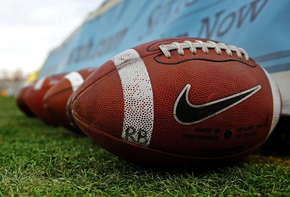 Detailed view of a Nike logo on a footballMark J&period; Rebilas-Imagn Images