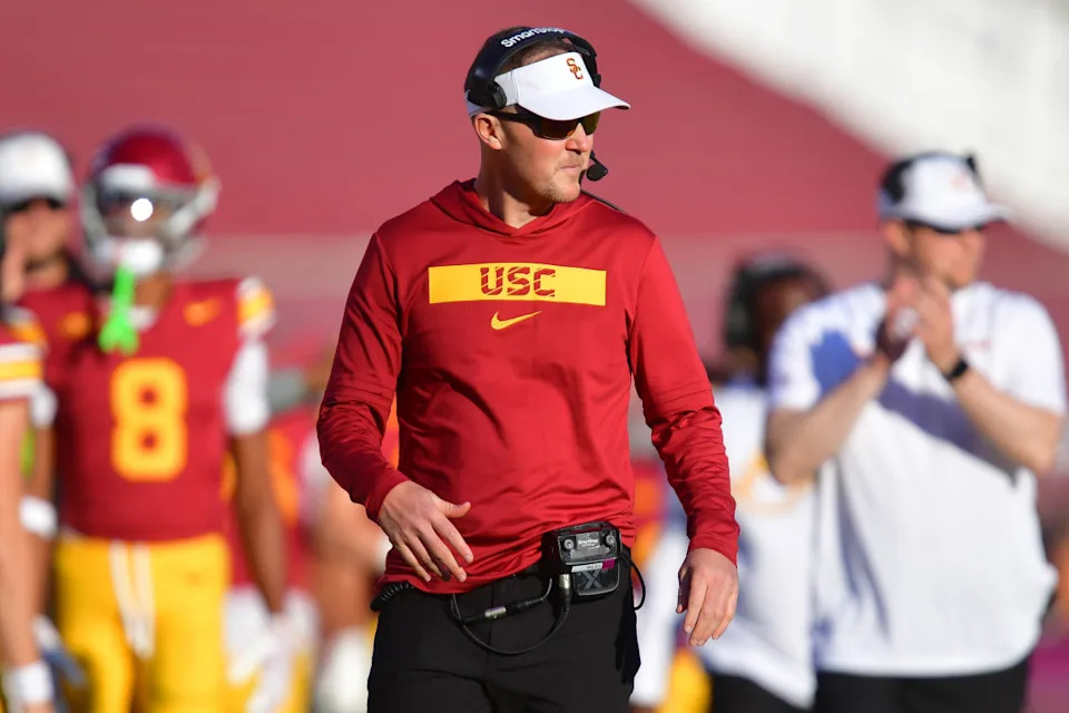 Nov 16, 2024; Los Angeles, California, USA; Southern California Trojans head coach Lincoln Riley watches game action against the Nebraska Cornhuskers during the second half at the Los Angeles Memorial Coliseum.© Gary A. Vasquez-Imagn Images
