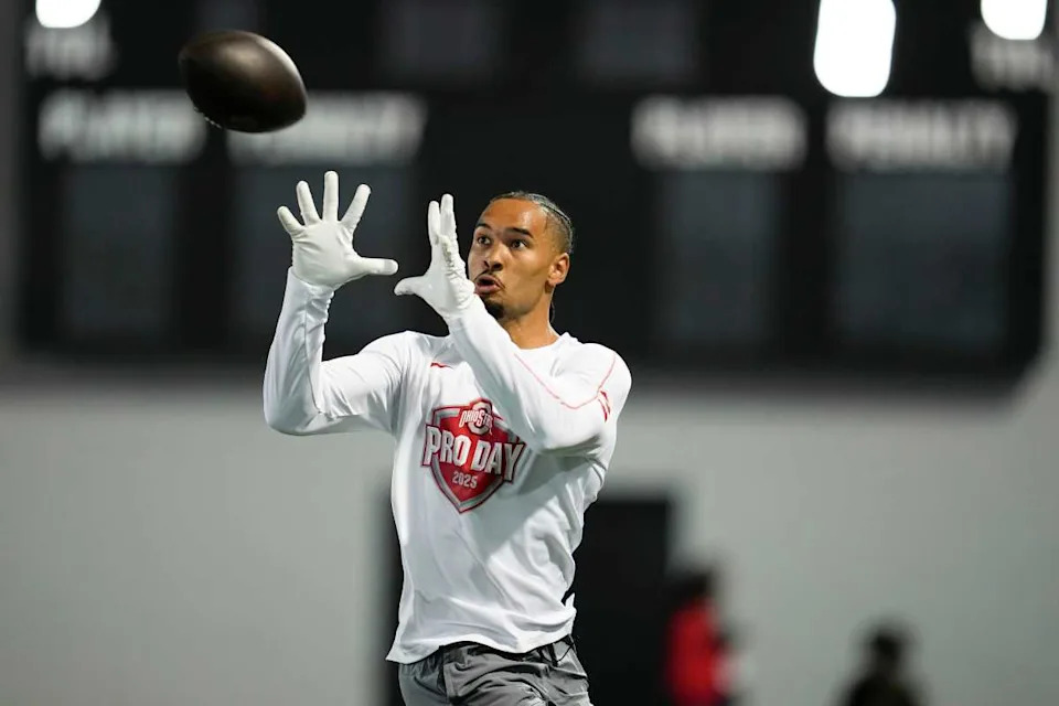 Ohio State Buckeyes wide receiver Emeka Egbuka catches a pass during the pro day for NFL scouts at the Woody Hayes Athletic CenteAdam Cairns/Columbus Dispatch / USA TODAY NETWORK via Imagn Images