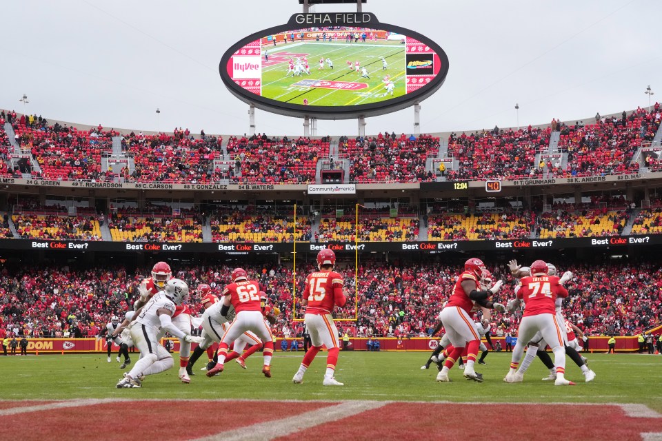 Kansas City Chiefs quarterback Patrick Mahomes throwing a football during an NFL game.