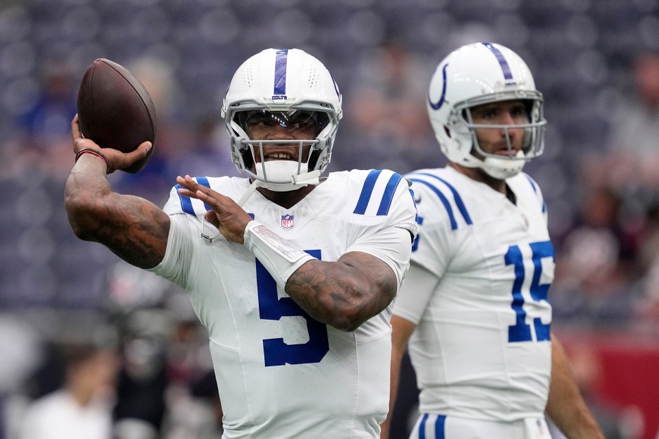 Indianapolis Colts quarterbacks Anthony Richardson (5) and Joe Flacco (15) warming up.