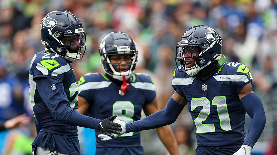 Seattle Seahawks cornerback Devon Witherspoon Riq Woolen...