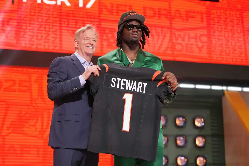 Shemar Stewart, NFL Commissioner Roger Goodell, and a Bengals jersey.