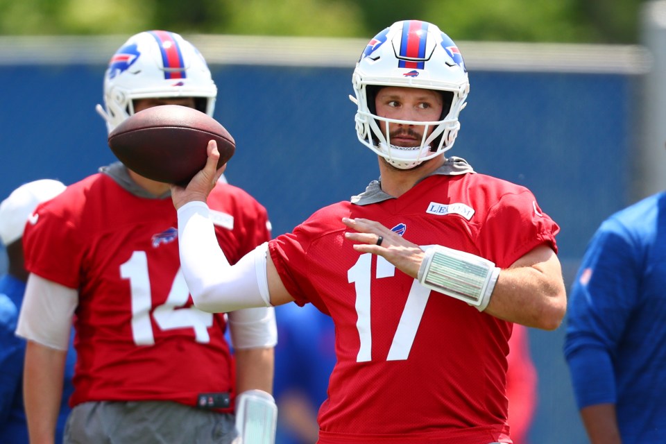 Josh Allen, Buffalo Bills quarterback #17, throws a football during practice.