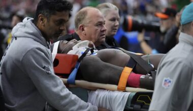 Miami's Grant DuBose taken off the field on a stretcher after hit to the head against Texans