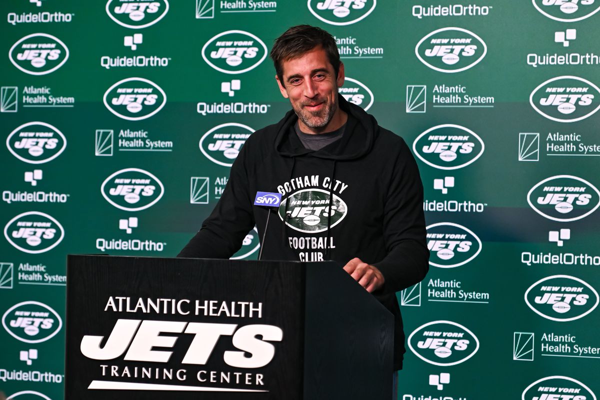 New York Jets quarterback Aaron Rodgers (8) speaks at a press conference after practice at Atlantic Health Jets Training Center. 