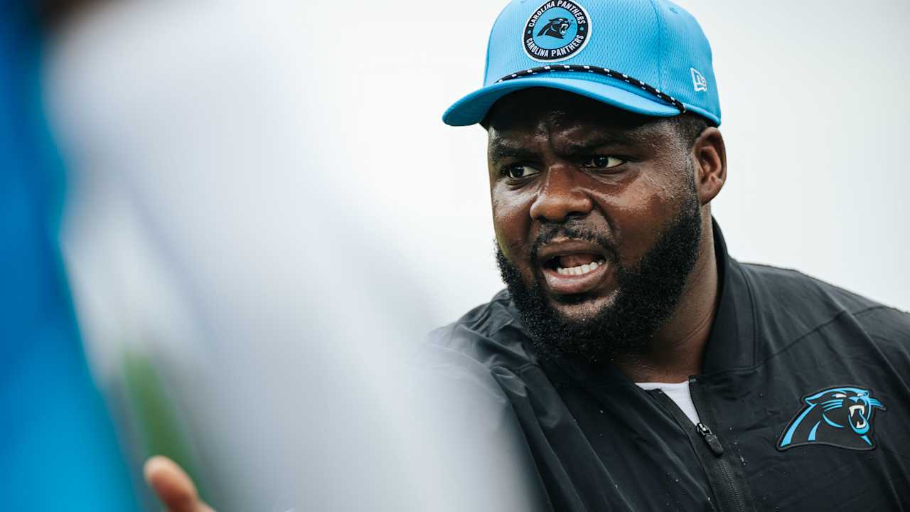 New outside linebackers coach AC Carter is a teacher first, with a whole new group of students