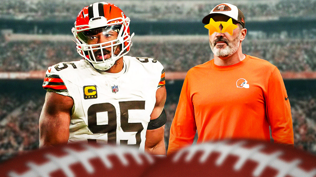 Myles Garrett on one side, Kevin Stefanski on the other side with stars in his eyes