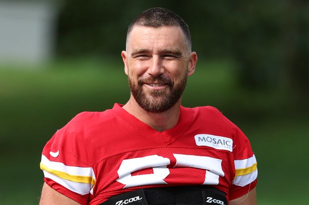 Travis Kelce smiles before training camp