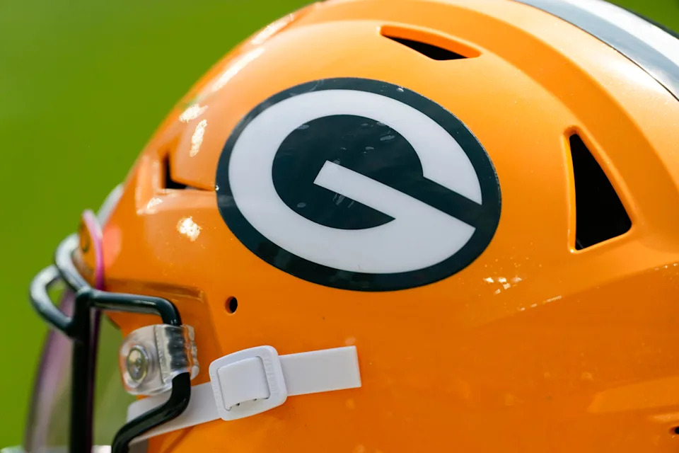 General view of a Green Bay Packers helmet during warmups prior to the game against the Baltimore Ravens.