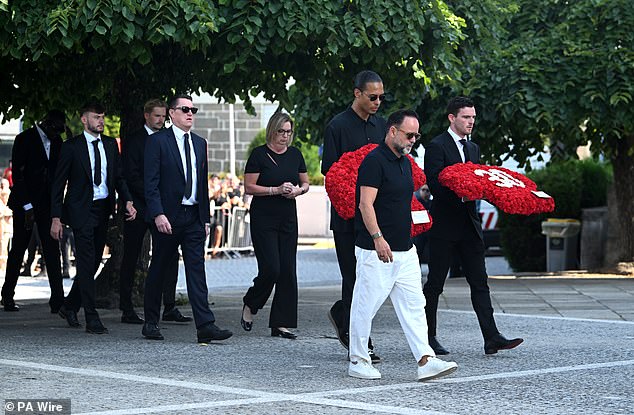 Liverpool's Virgil Van Dijk and Andy Robertson arrive at the funeral of Diogo Jota and Andre Silva