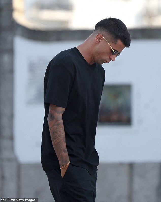 Portuguese defender Joao Cancelo cuts a solemn figure as he arrives for the funeral of Diogo Jota and his brother Andre Silva