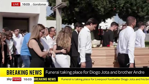 Diogo Jota's wife Rute Cardoso is consoled by a friend as she follows the coffins of the 28-year-old and his brother Andre Silva, 25, during a joint funeral service