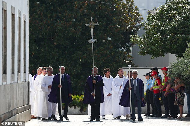 People take part in a funeral procession of Portuguese footballers and brothers Diogo Jota and  Andre Silva in Gondomar