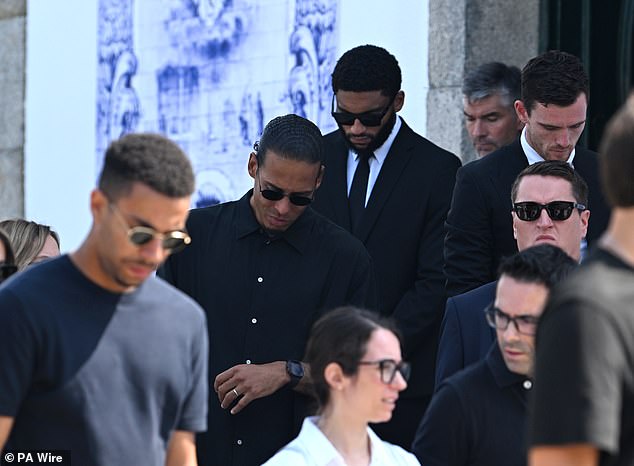 Liverpool's captain Virgil van Dijk, defender Joe Gomez and defender Andy Robertson leave the Igreja Matriz de Gondomar following Jota and Andre's funeral service