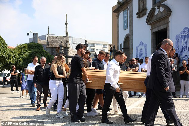 Relatives follow the coffin of Portuguese football player Diogo Jota carried out of the church after a joint funeral for him and his brother Andre