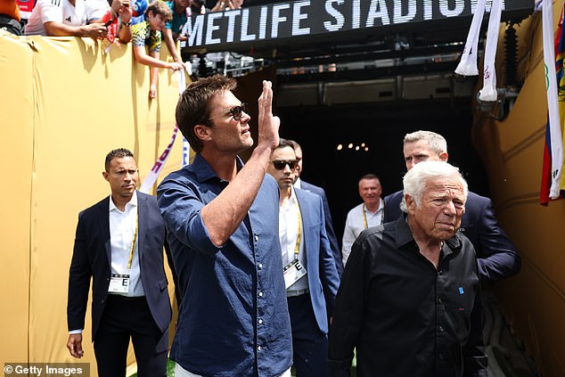 Brady waves to fans at MetLife Stadium on Sunday before Chelsea beat PSG