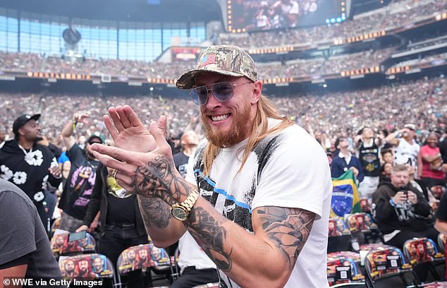 Kittle (seen above at Wrestlemania 41) has hinted at possibly going to WWE when he retires