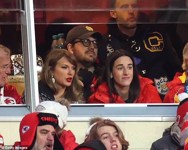 Caitlin Clark (R) opened up about what it's like sitting in a luxury box with Taylor Swift