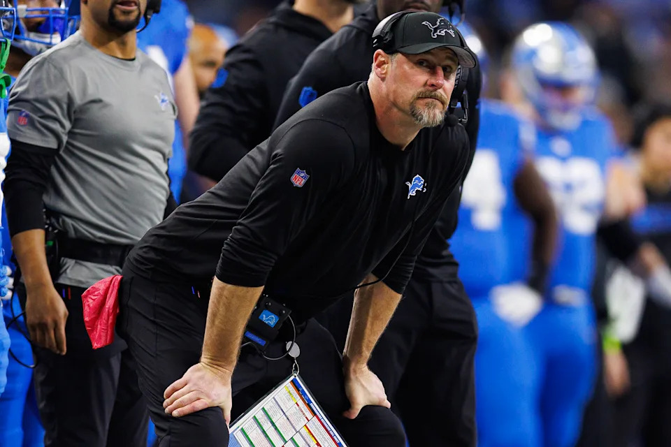 Lions coach Dan Campbell looks on during his team's divisional round playoff loss to the Commanders last season. (Photo by Brooke Sutton/Getty Images)