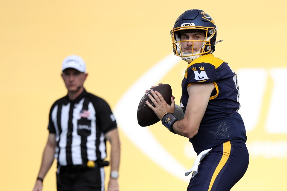 Memphis Showboats quarterback Luis Perez #12 prepares to throw the football.