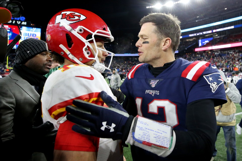 Tom Brady and Patrick Mahomes talking after a game.
