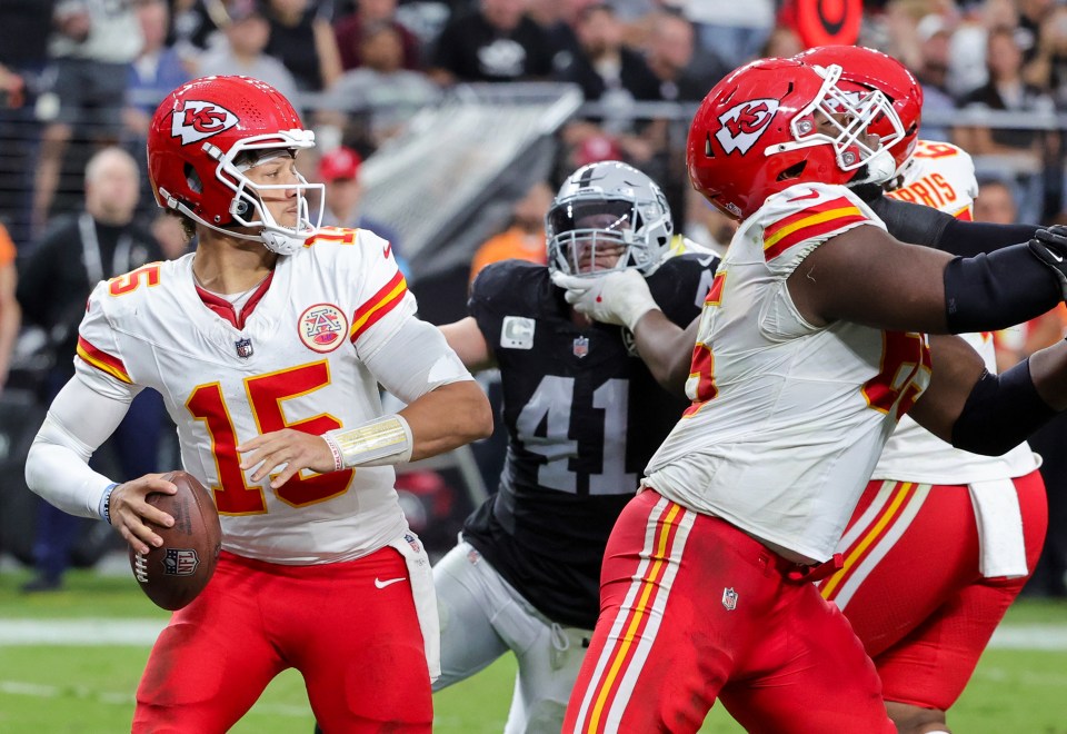 Patrick Mahomes #15 of the Kansas City Chiefs throws a football.