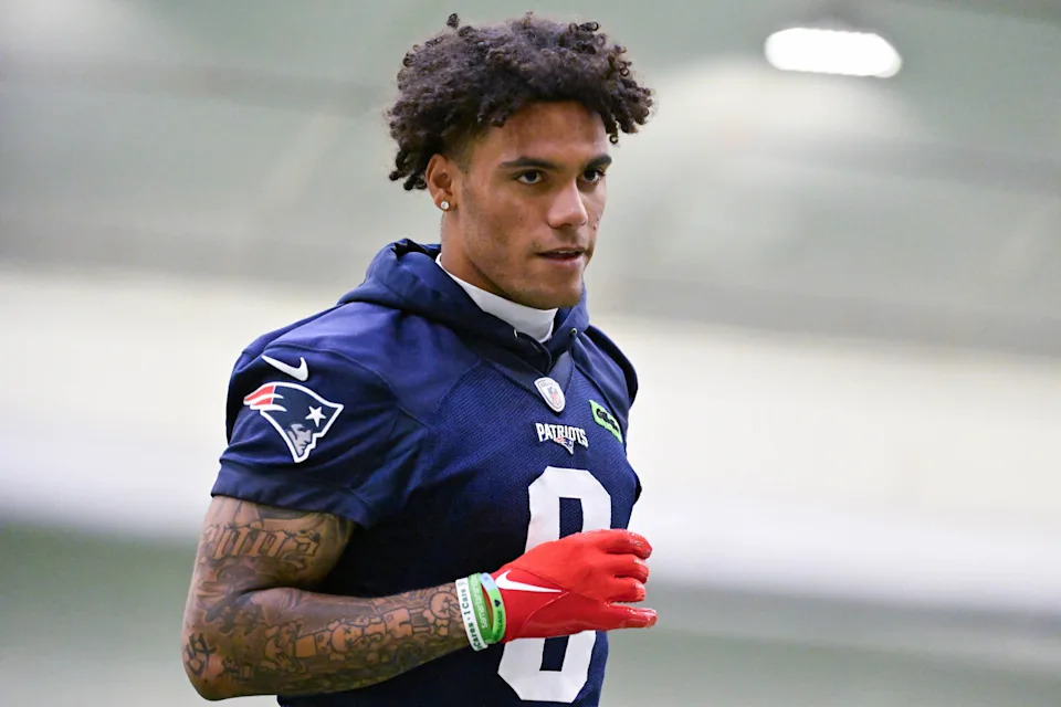 Jun 10, 2025; Foxborough, MA, USA; New England Patriots cornerback Christian Gonzalez (0) jogs to the sideline during minicamp held in the WIN Field House at Gillette Stadium. Mandatory Credit: Eric Canha-Imagn Images