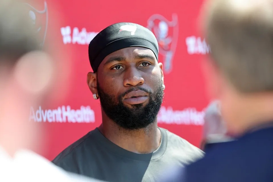 Jun 11, 2025; Tampa, FL, USA; Tampa Bay Buccaneers linebacker Haason Reddick (5) talks with media after minicamp at One Buc Place.© Kim Klement Neitzel-Imagn Images