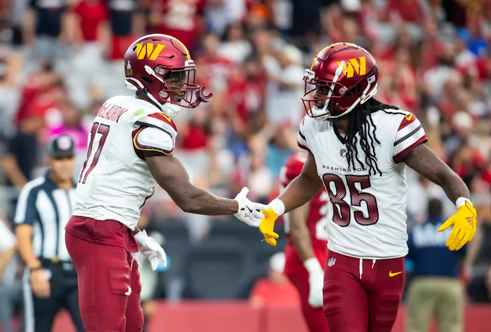 Washington Commanders wide receiver Terry McLaurin (17) celebrates a touchdown with Noah Brown (85) against the Arizona Cardinals in the second half at State Farm Stadium.Mark J. Rebilas-Imagn Images