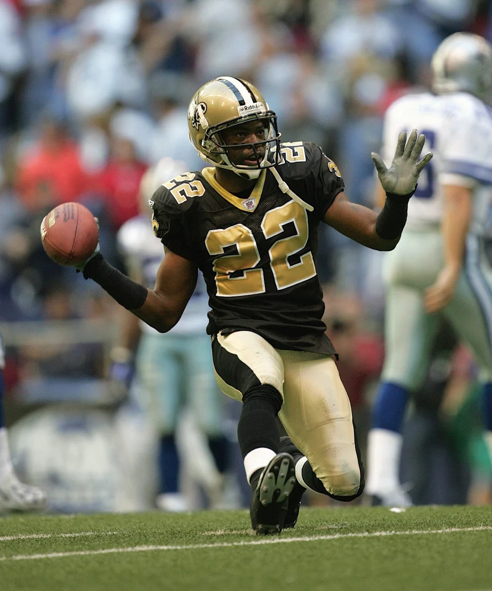 IRVING, TX - DECEMBER 12: Cornerback Fred Thomas #22 of the New Orleans Saints celebrates during the game against the Dallas Cowboys on December 12, 2004 at Texas Stadium in Irving, Texas. The Saints defeated the Cowboys 27-13. (Photo by Ronald Martinez/Getty Images)