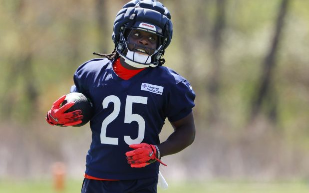 Running back Kyle Monangai carries the football during Bears rookie camp at Halas Hall on May 9, 2025, in Lake Forest. (Stacey Wescott/Chicago Tribune)
