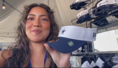 Touring the famous merchandise tent at Dallas Cowboys training camp