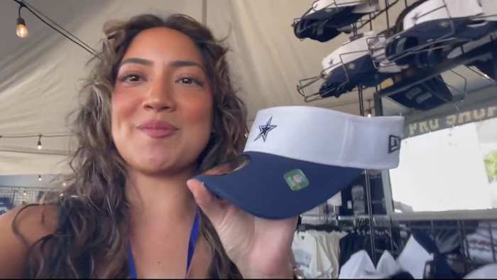 Touring the famous merchandise tent at Dallas Cowboys training camp