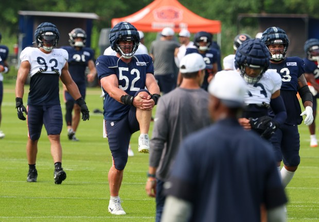Chicago Bears center Drew Dalman (52) stretches out during training camp on July 28, 2025, in Lake Forest. (Stacey Wescott/Chicago Tribune)