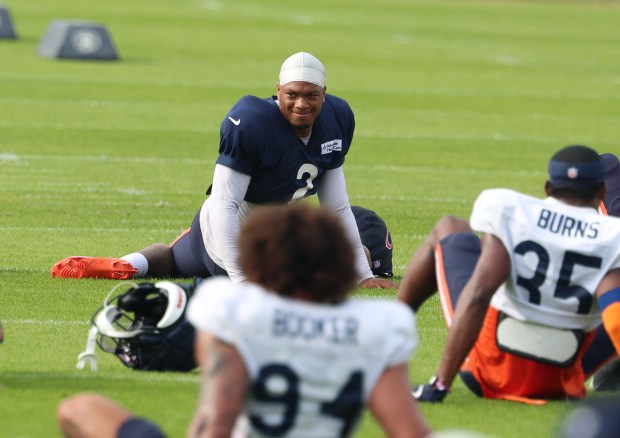Chicago Bears wide receiver DJ Moore (2) turns around during stretching out at training camp on July 28, 2025, in Lake Forest. (Stacey Wescott/Chicago Tribune)