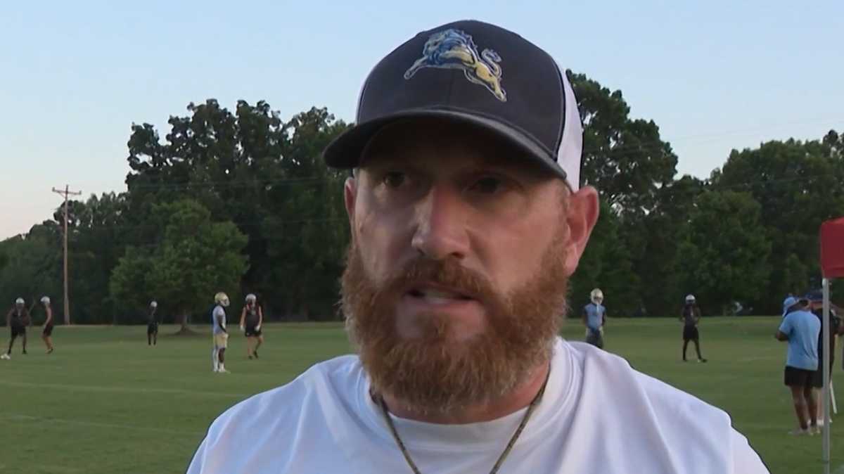 Coach placed on leave amid investigation into football camp incident